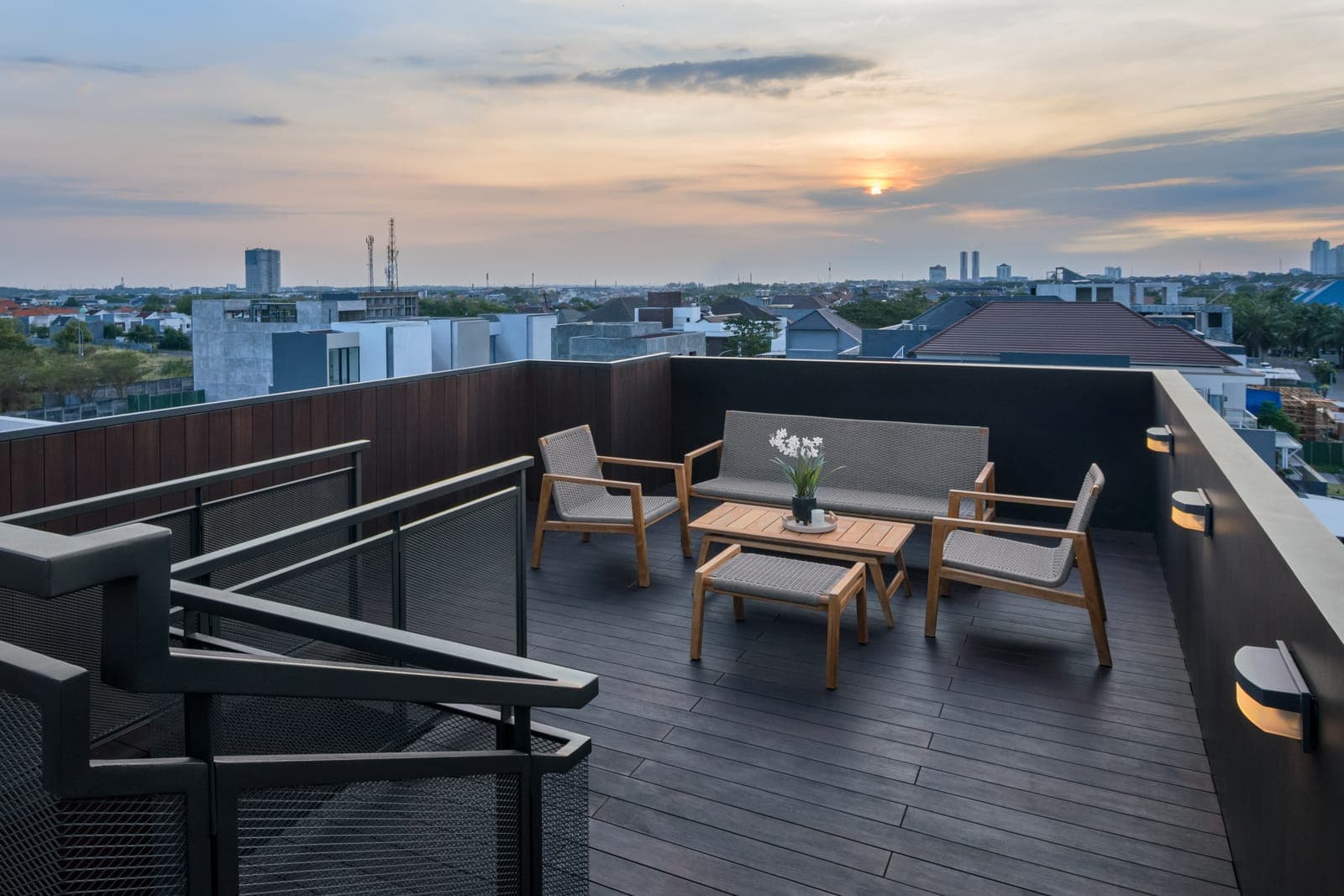 The roof terrace, and the city beyond it.