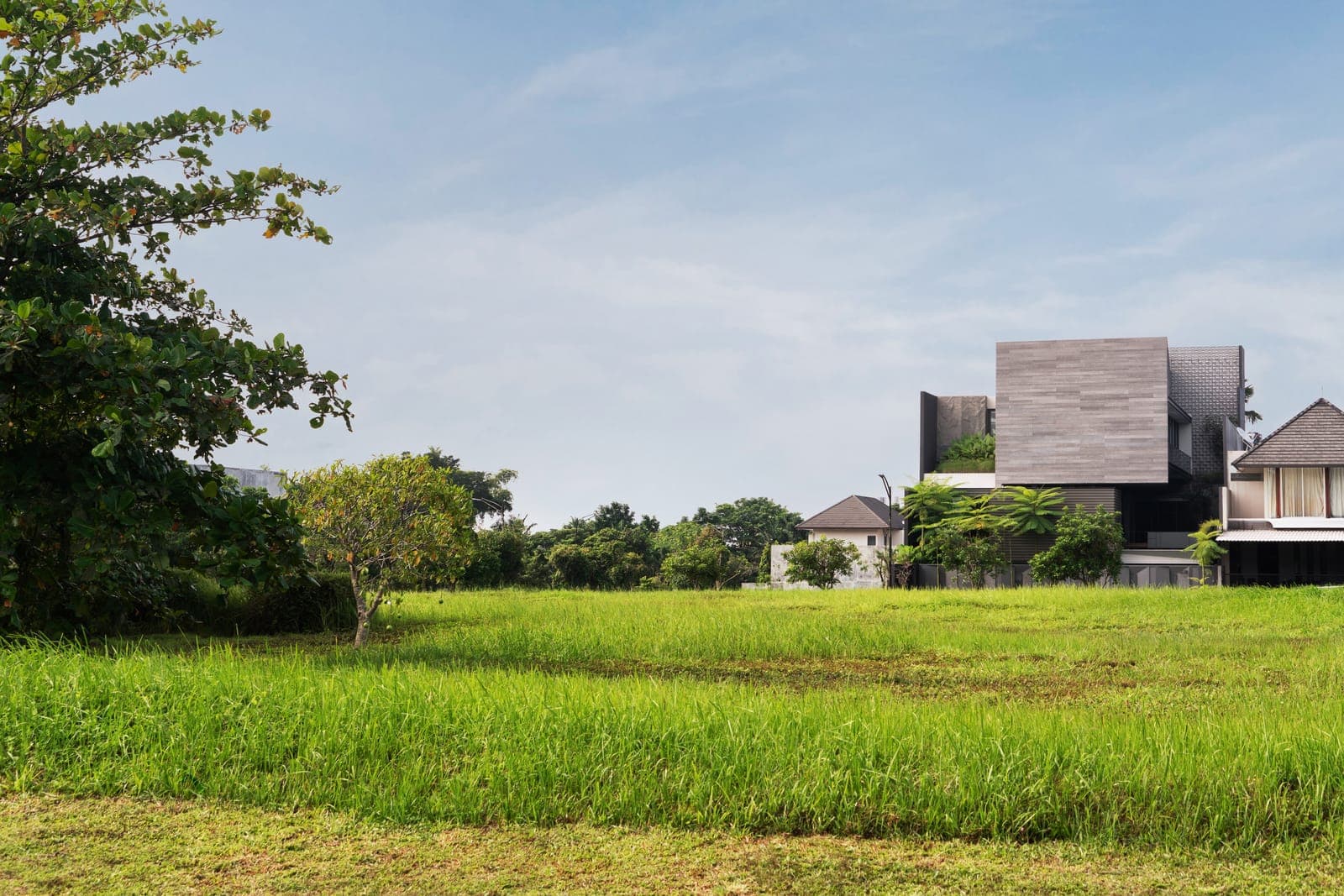 The house from across the open ground.