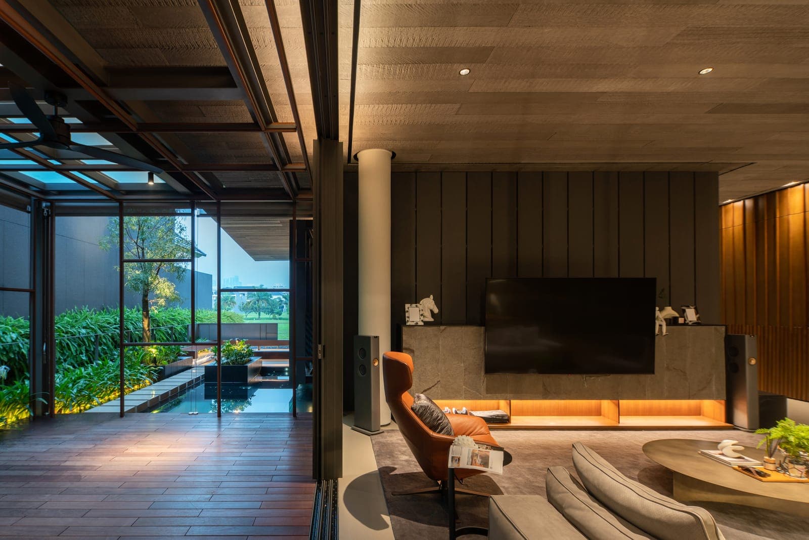 The main room, open the full width to the deck and pool.