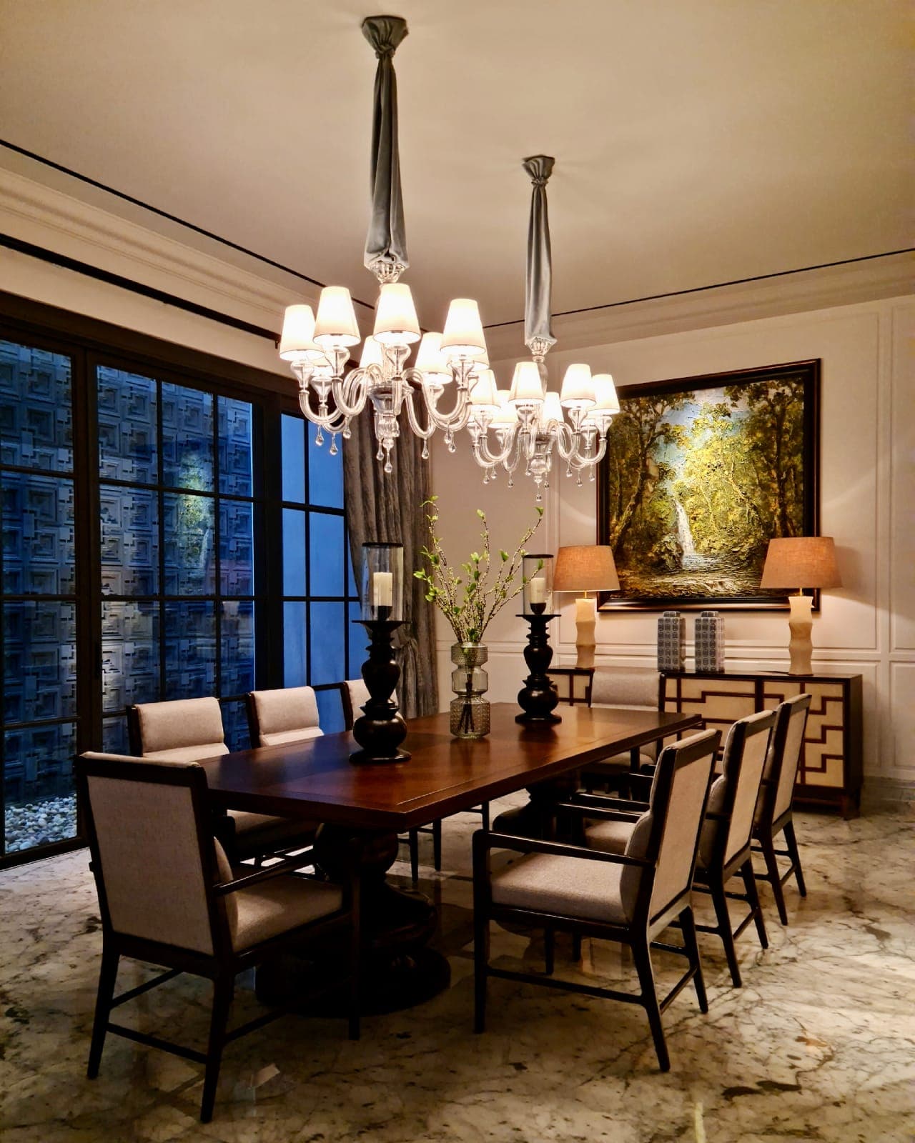 The dining room after dark, the glass gone black.