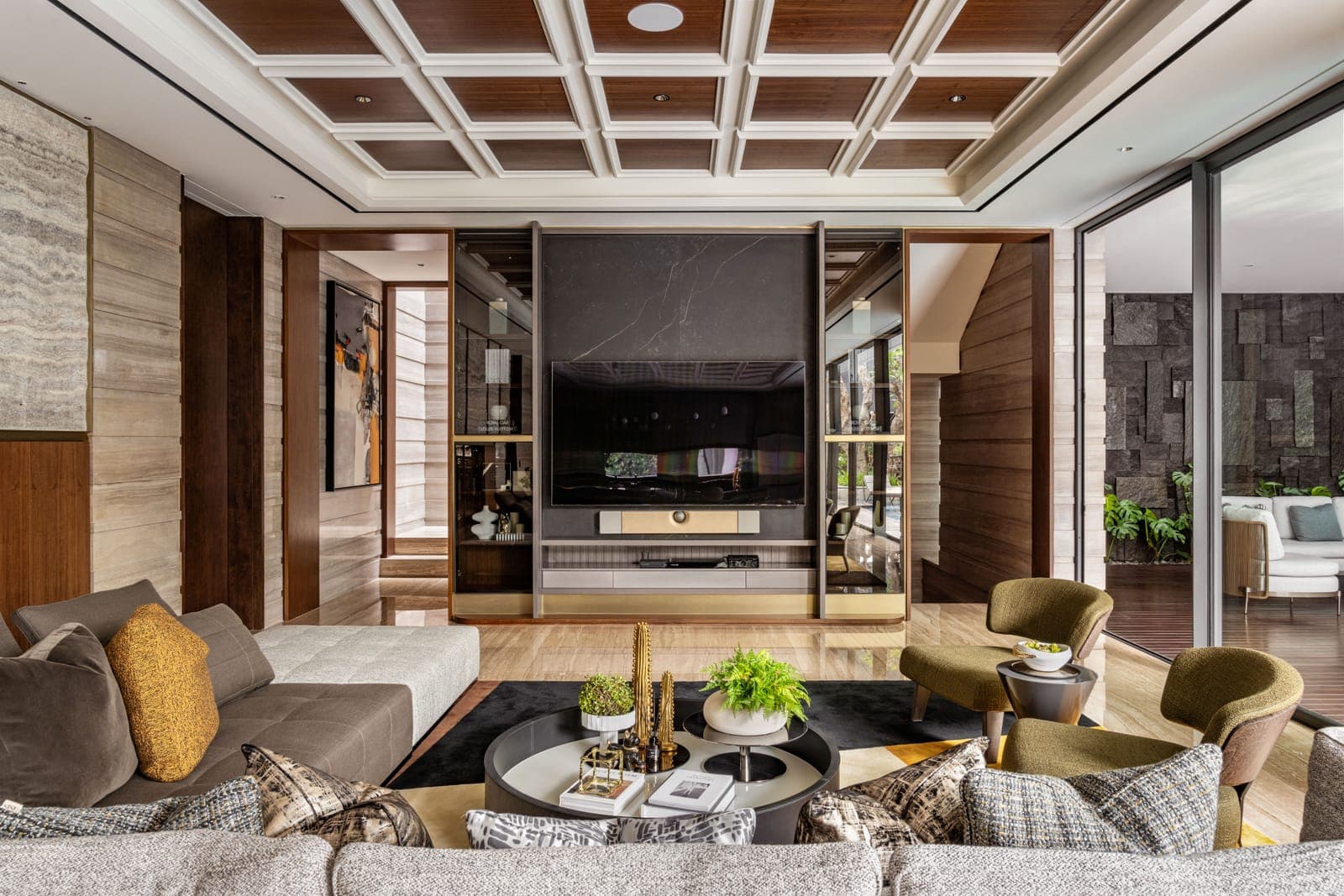 The living room, glazed to the court.