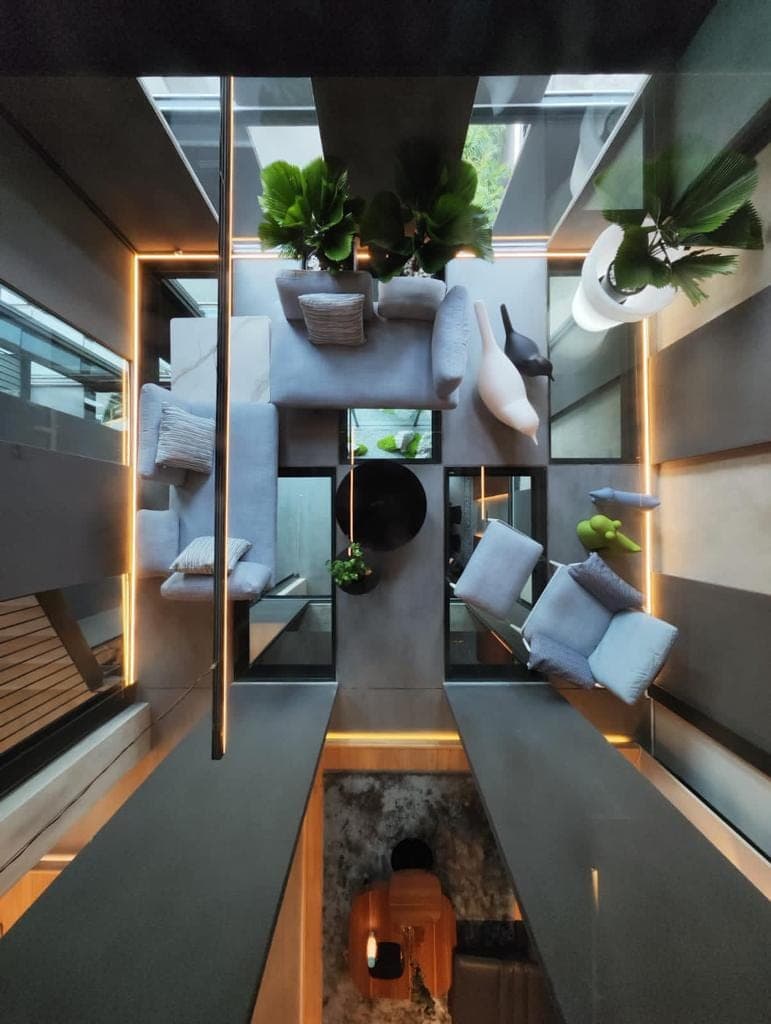 Down through the glass floor to the lounge below.