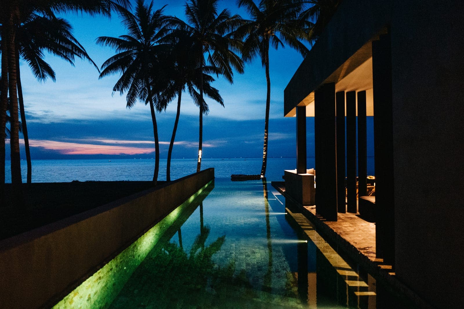 Dusk over the water, the interior beginning to show.