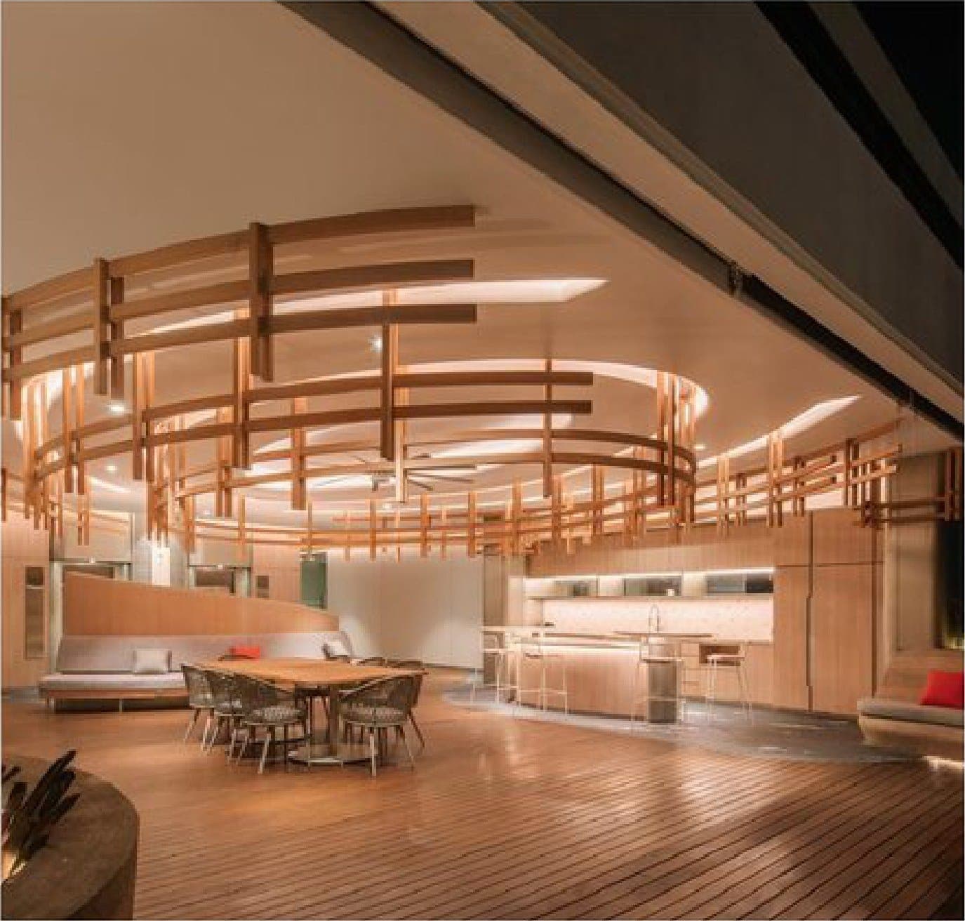 The rooftop pavilion and its woven timber crown.