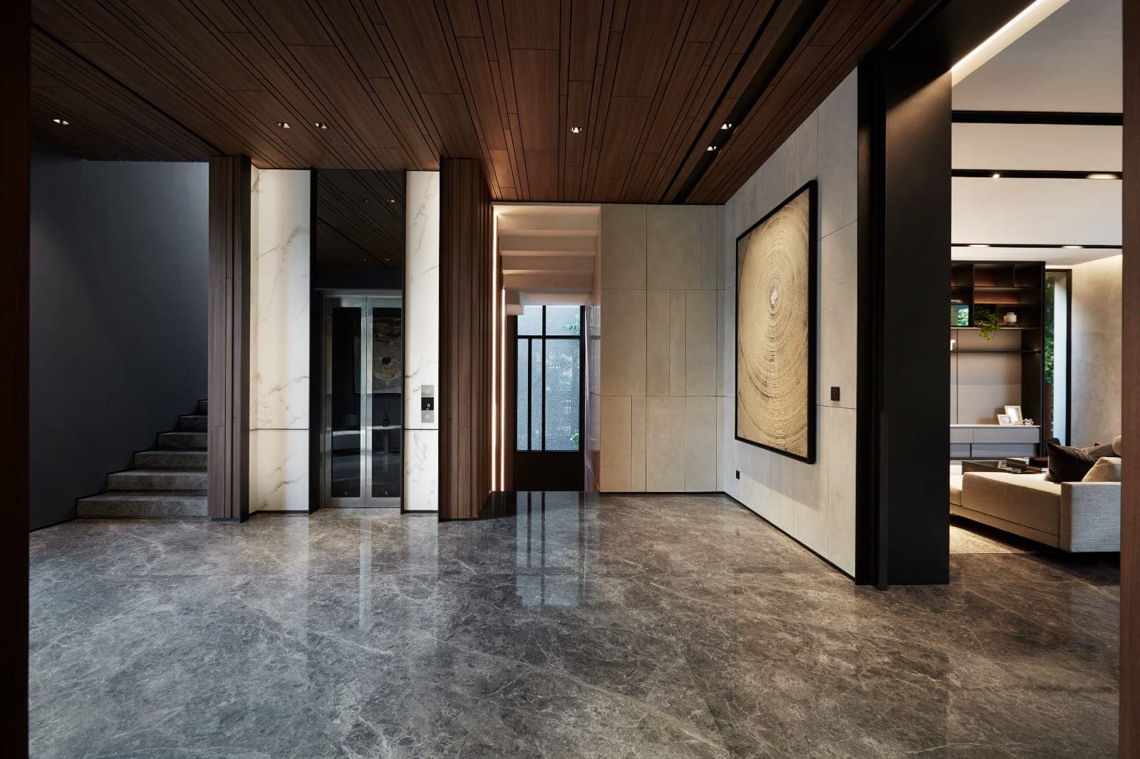 The entrance hall, in stone and timber.